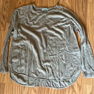Curved bottom tunic
